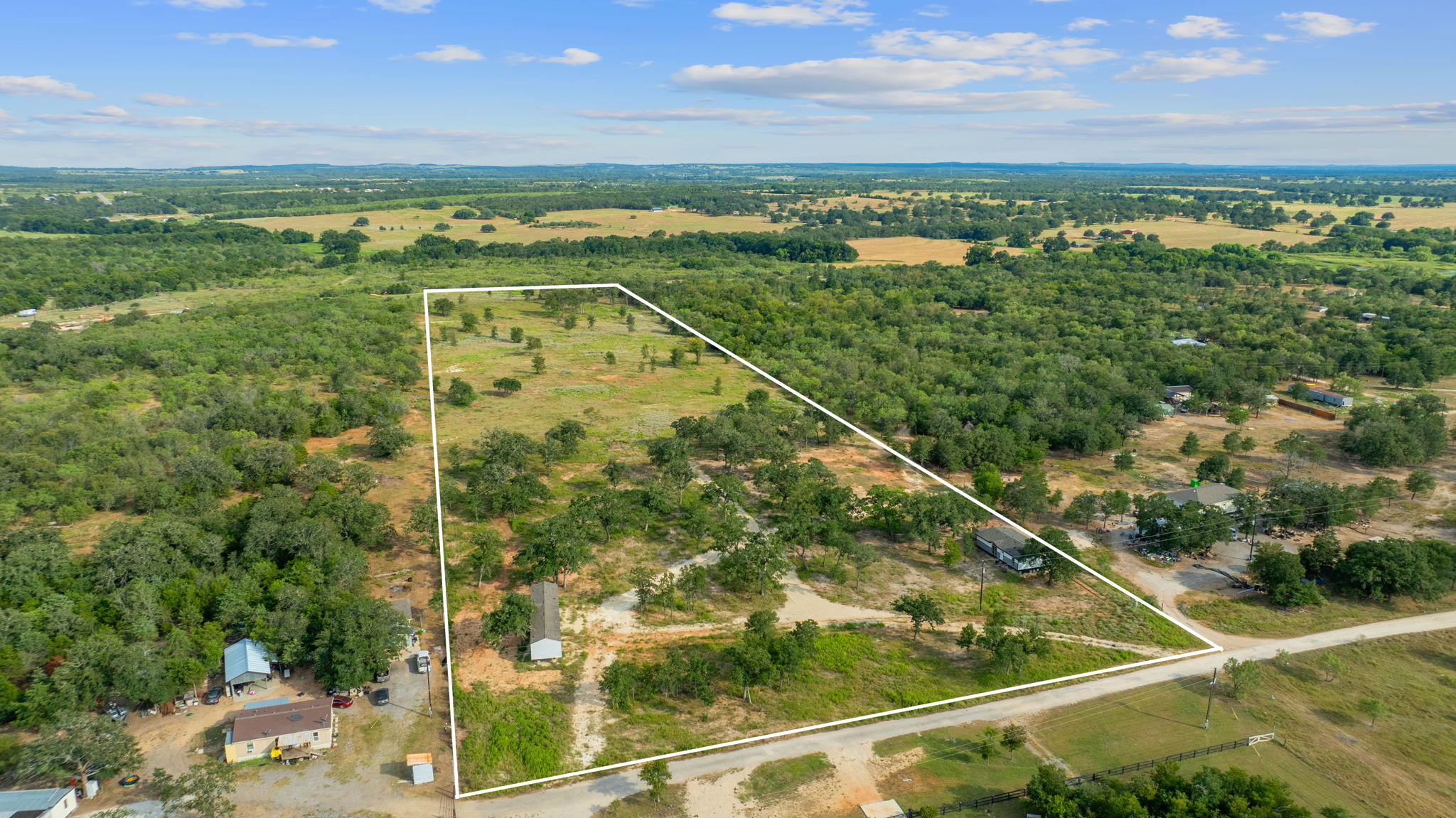 1385 Pettytown Road Dale, TX 78616 - Photo 17 of 17 Aerial view of sparsely populated area featuring property boundaries highlighted