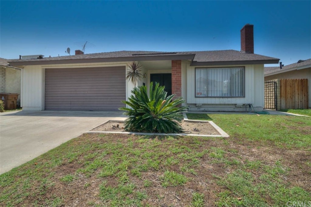 183 South Barbara Way Anaheim, CA 92806 - Photo 1 of 1 a view of a house with a yard
