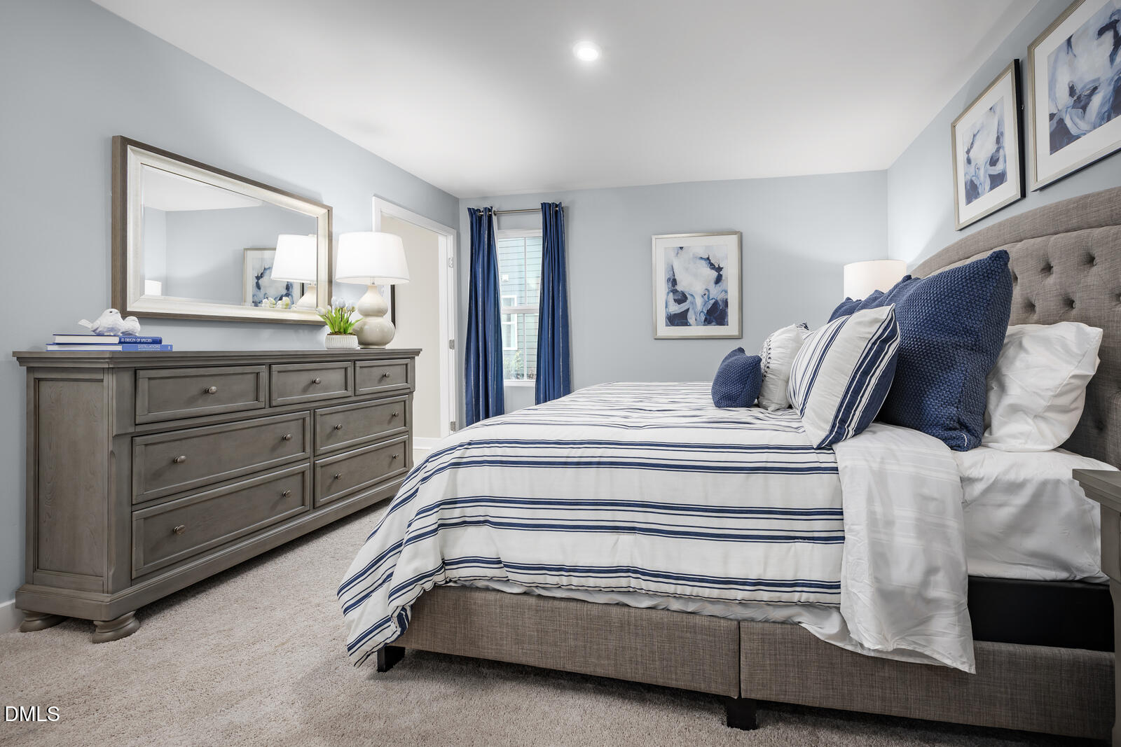 505 Nemesia Drive Wendell, NC 27591 - Photo 10 of 23 a bedroom with a bed and a dresser