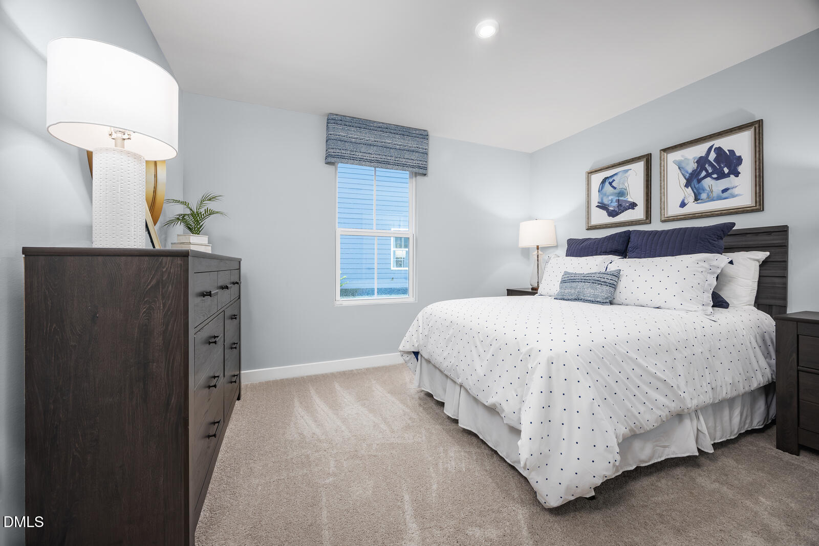 505 Nemesia Drive Wendell, NC 27591 - Photo 12 of 23 a bedroom with a bed and a lamp on dresser
