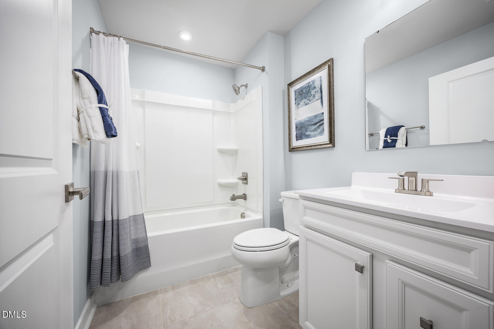 505 Nemesia Drive Wendell, NC 27591 - Photo 13 of 23 a bathroom with a sink a toilet and a tub
