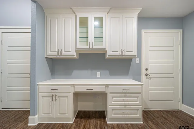 a view of cabinets and window