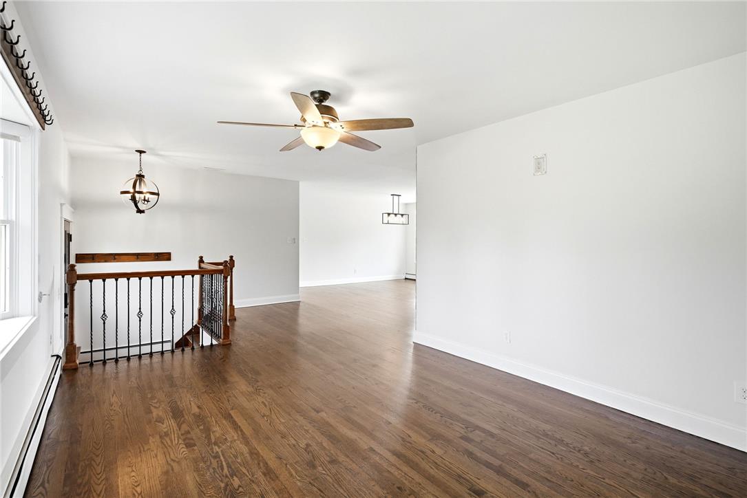 463 North Penn Dixie Road Bath, PA 18014 - Photo 13 of 86 Rich hardwood flooring and crisp white walls create an inviting, airy living space.