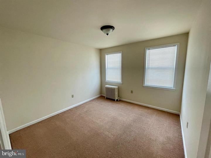122 West Lancaster Avenue Wayne, PA 19087 - Photo 7 of 8 an empty room with windows