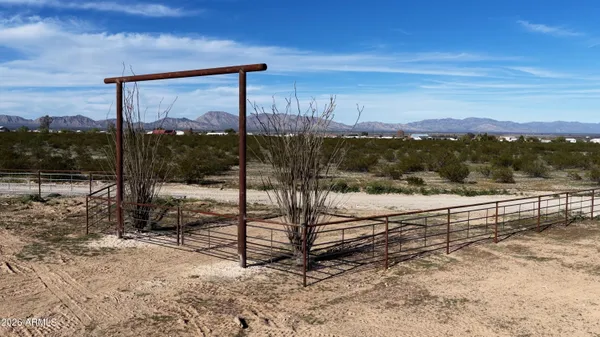 a view of a yard with an outdoor seating