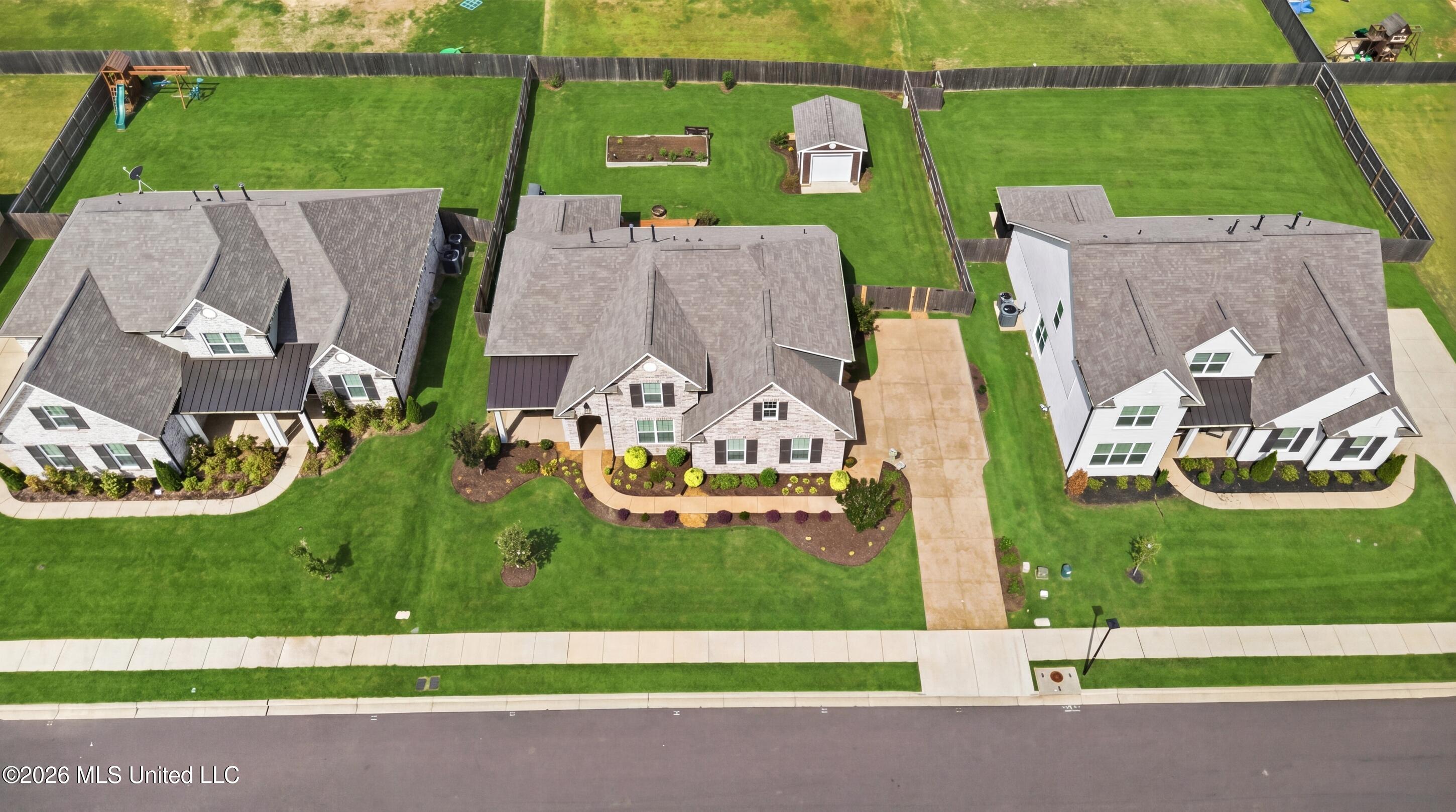 6763 Sunrise Loop West Olive Branch, MS 38654 - Photo 33 of 37 dji_0003_print_grass