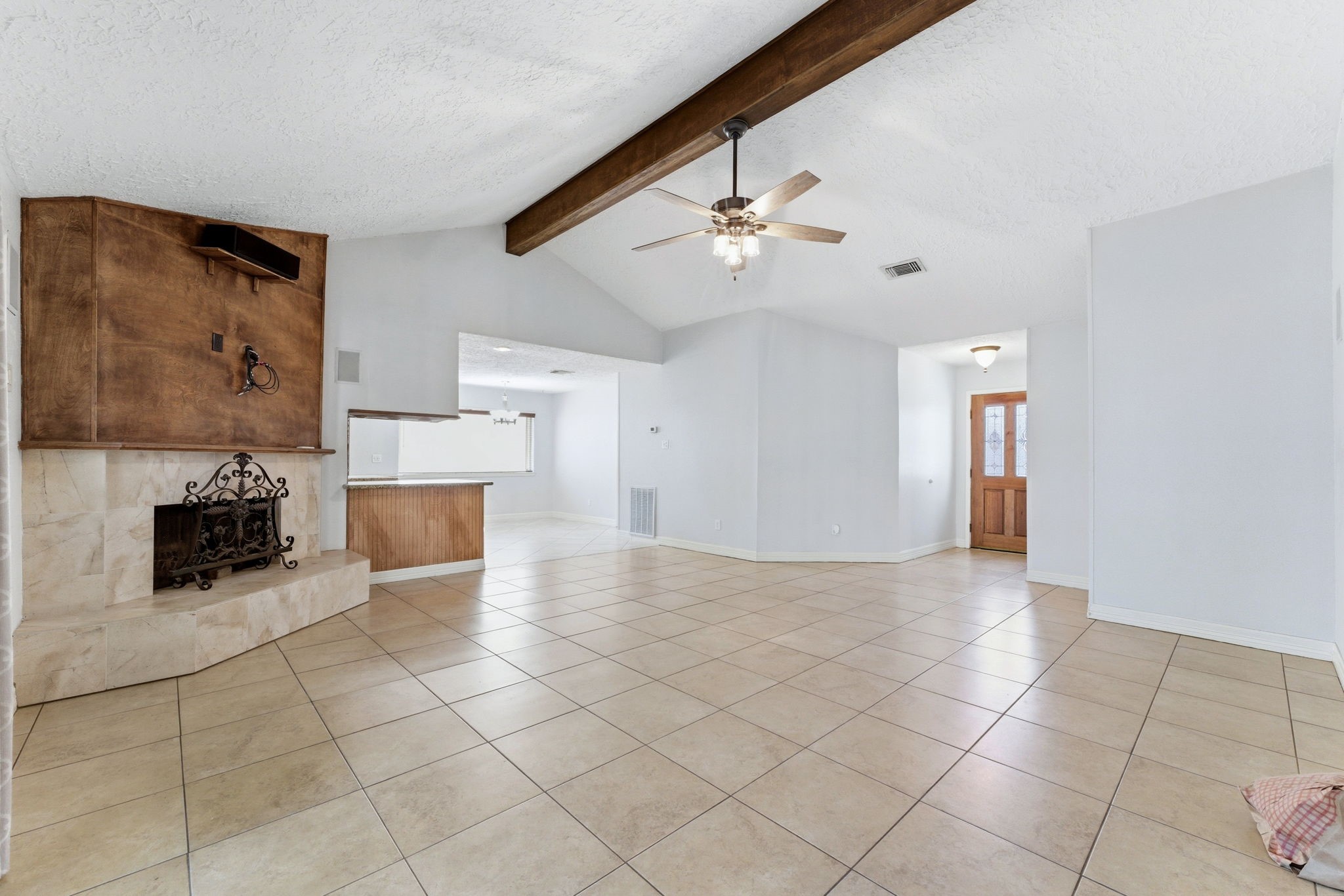 21514 Slippery Creek Lane Spring, TX 77388 - Photo 6 of 27 a view of a kitchen with furniture and a ceiling fan