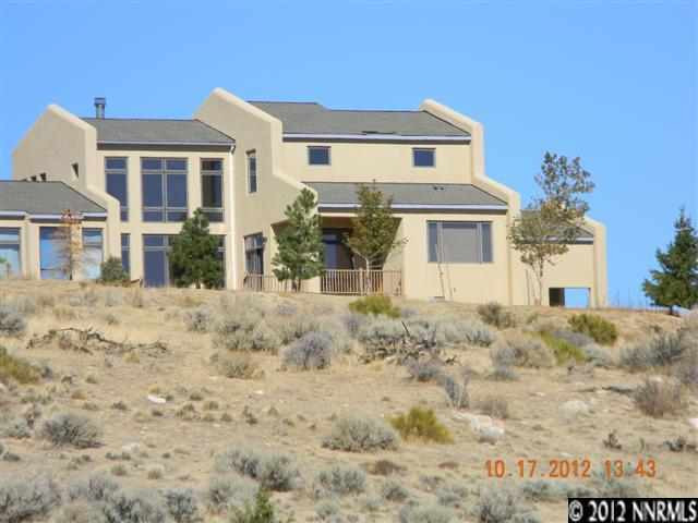 1240 Argosy Road Reno, NV 89508 - Photo 1 of 1 a front view of a house with a yard