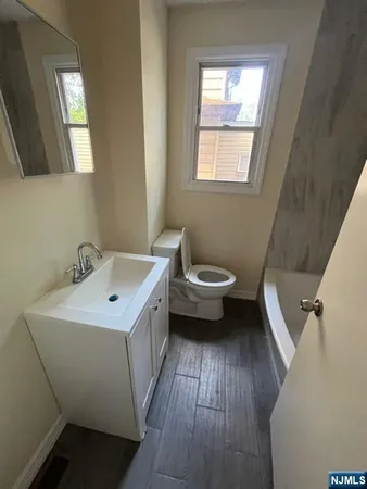 a bathroom with a sink and a toilet