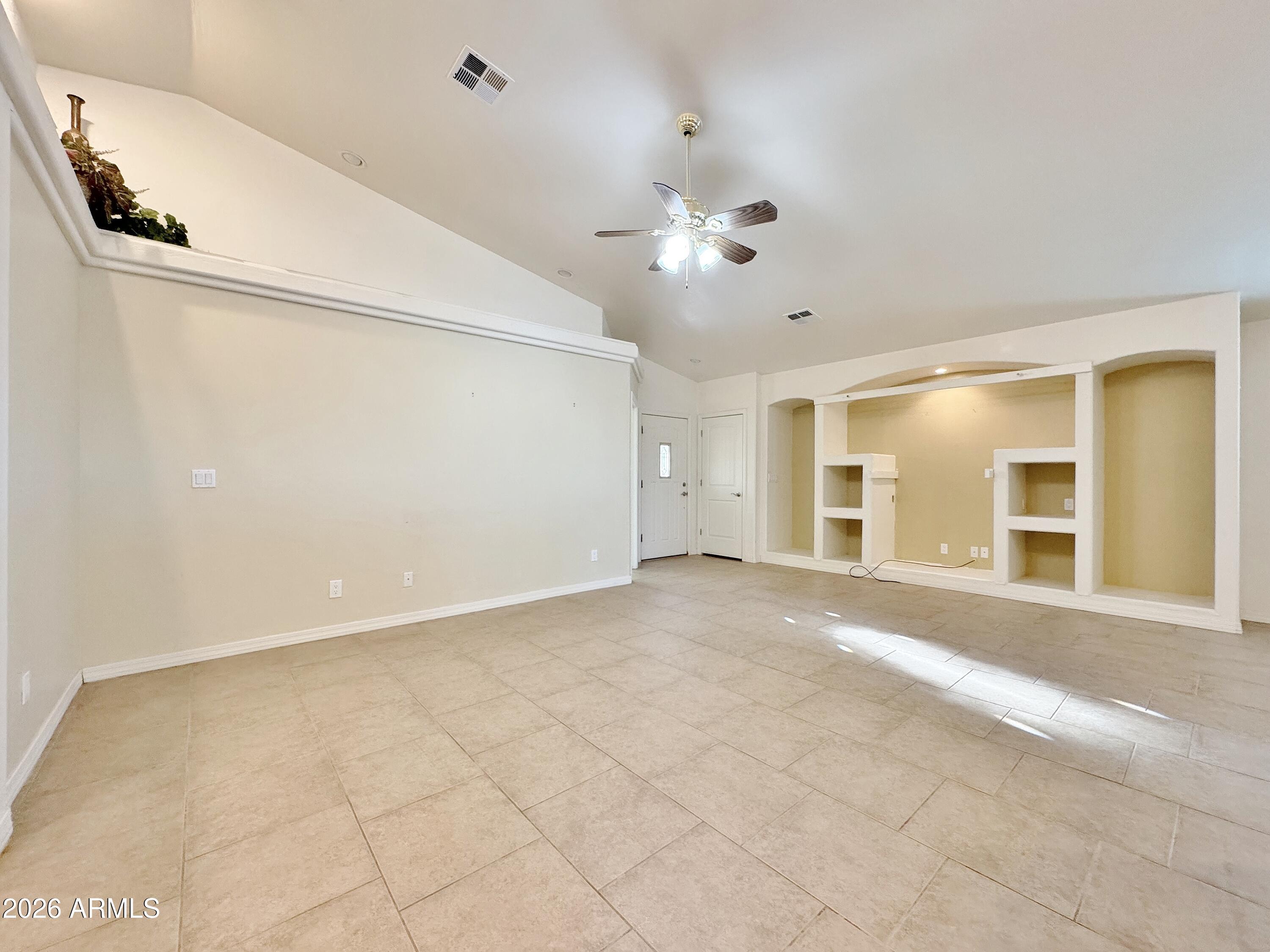 15774 South Saxon Road Arizona City, AZ 85123 - Photo 11 of 53 a view of an empty room with a window