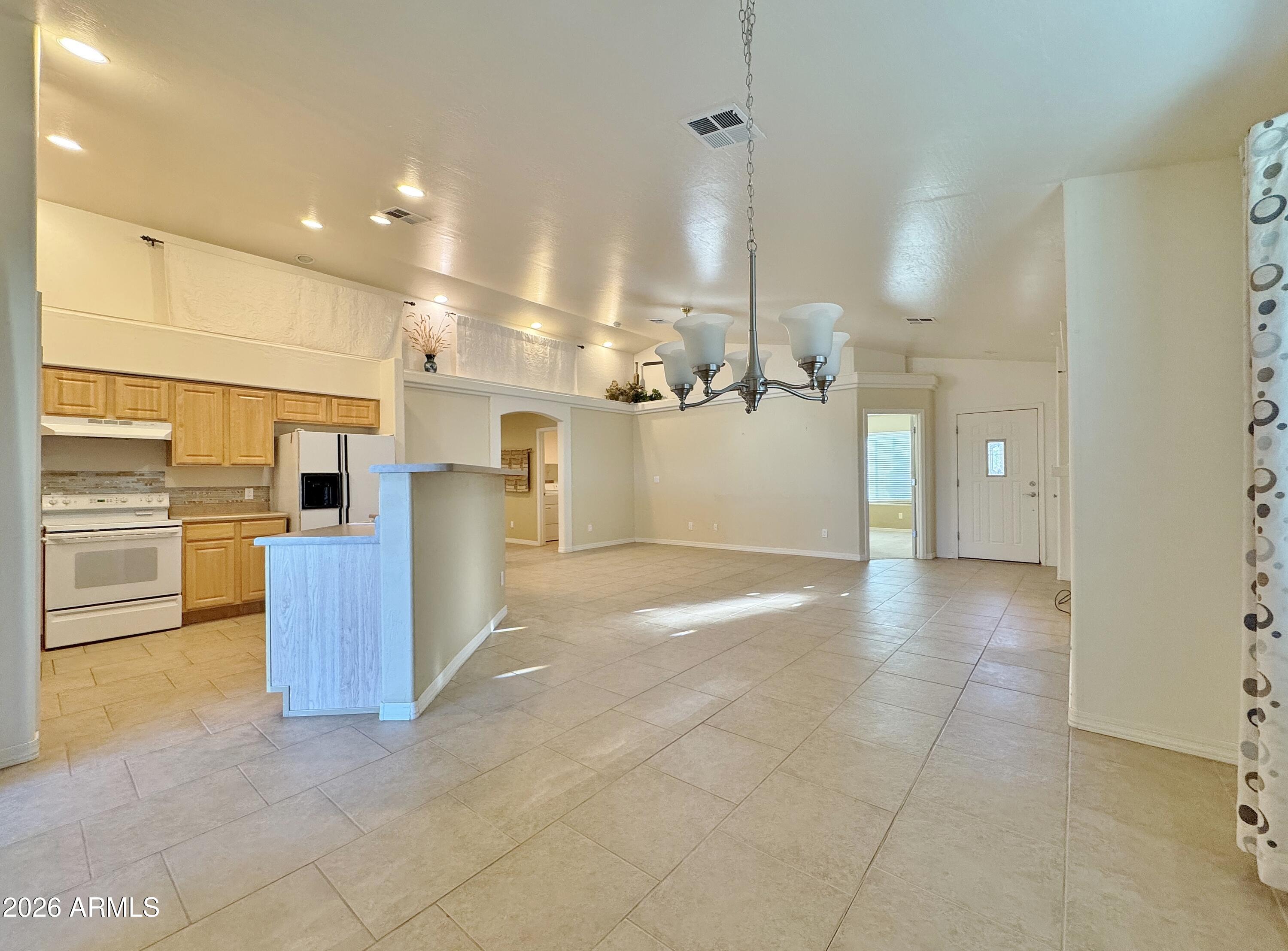 15774 South Saxon Road Arizona City, AZ 85123 - Photo 12 of 53 a view of a kitchen and a kitchen