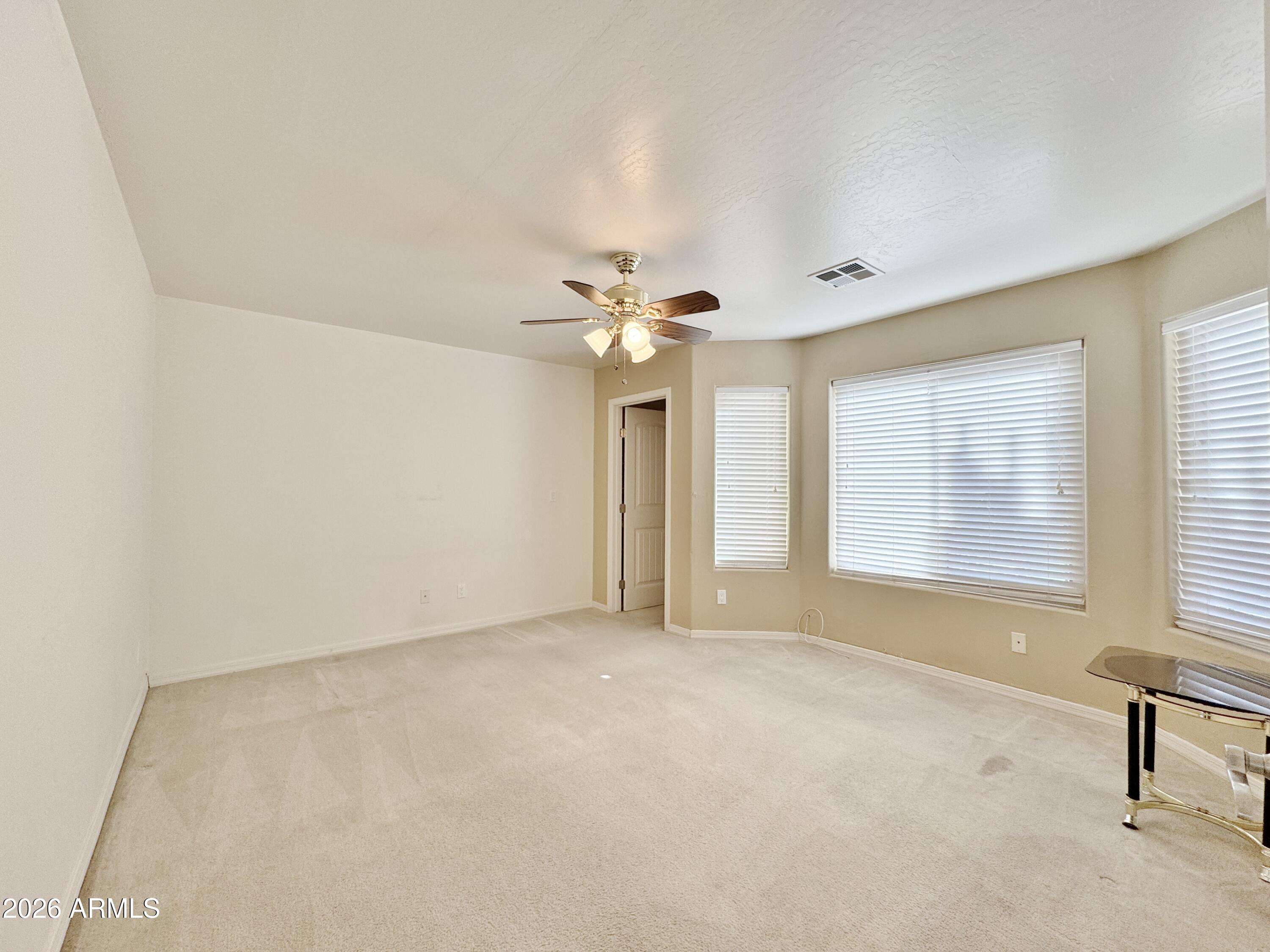 15774 South Saxon Road Arizona City, AZ 85123 - Photo 31 of 53 a view of an empty room with a window
