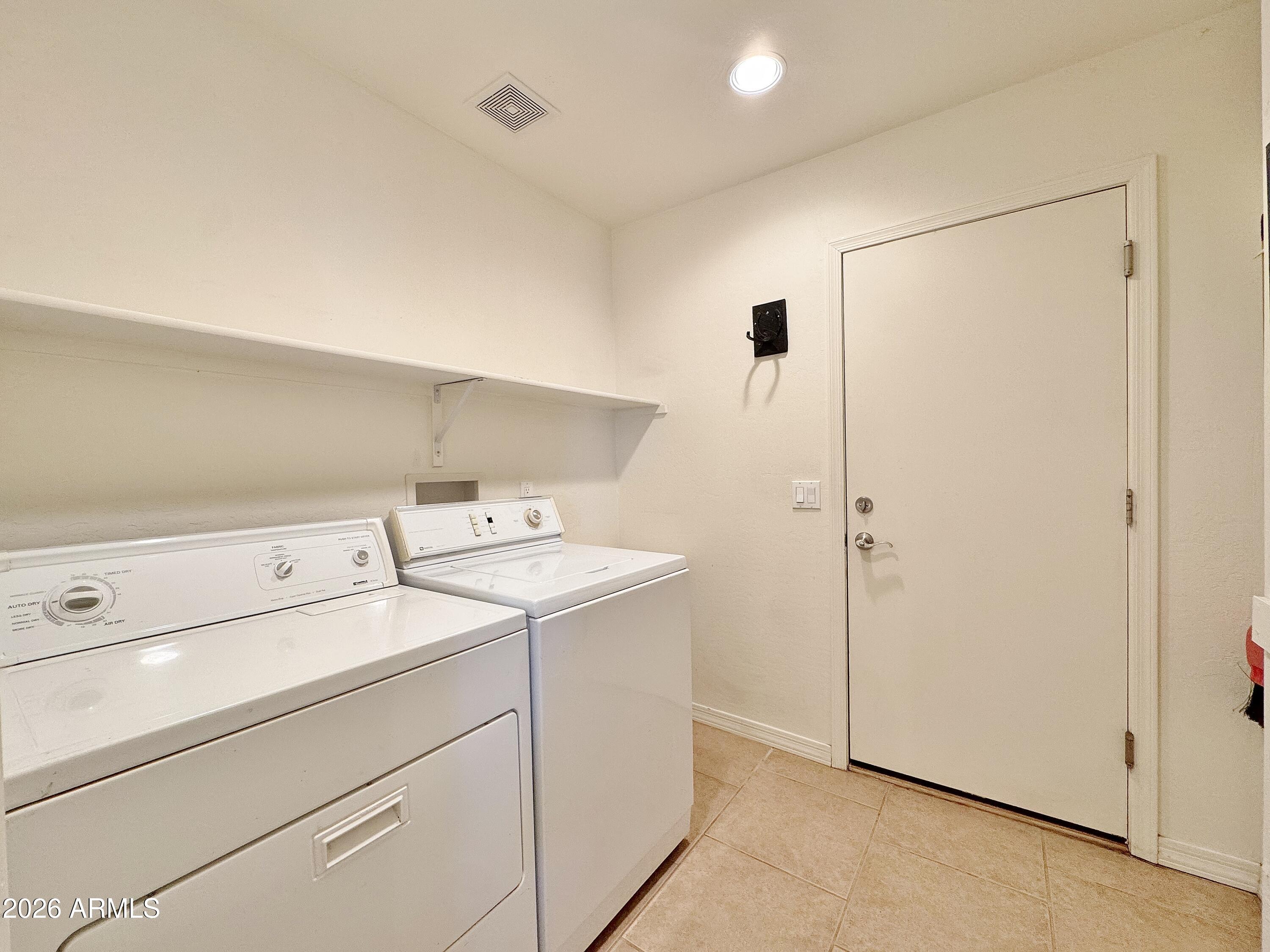 15774 South Saxon Road Arizona City, AZ 85123 - Photo 36 of 53 a utility room with dryer and washer