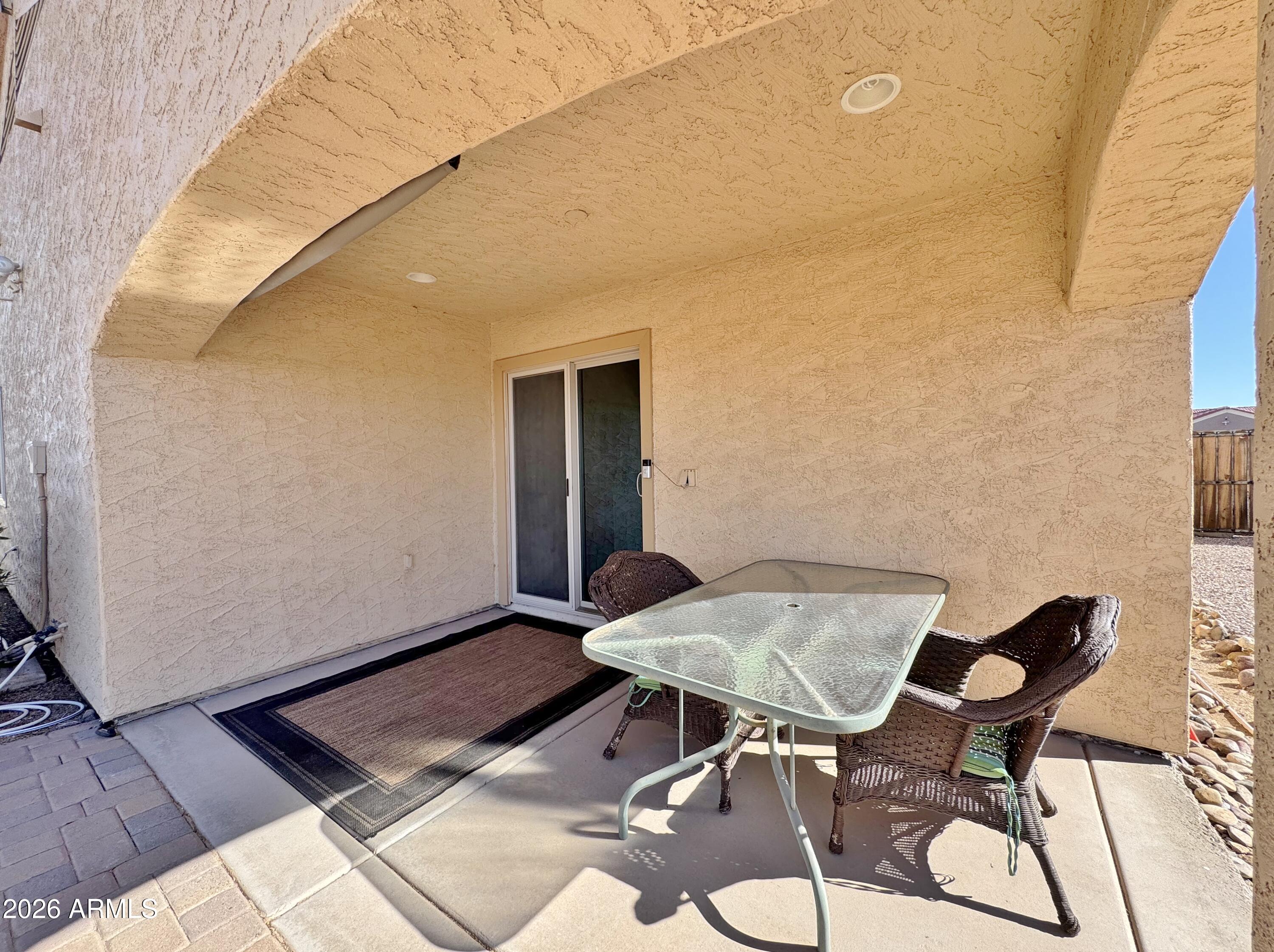 15774 South Saxon Road Arizona City, AZ 85123 - Photo 43 of 53 a view of a patio with table and chairs and potted plants