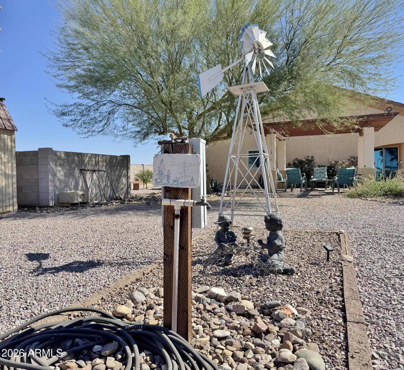 15774 South Saxon Road Arizona City, AZ 85123 - Photo 51 of 53 a front view of a house with a yard