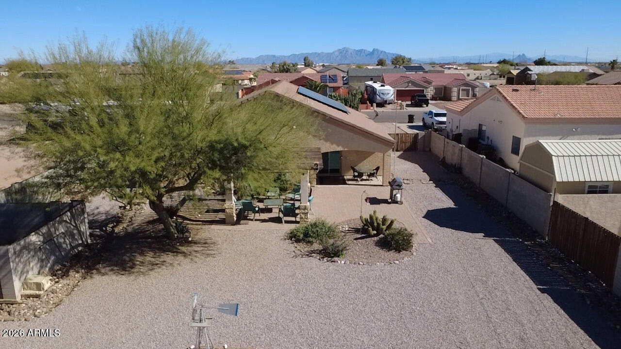 15774 South Saxon Road Arizona City, AZ 85123 - Photo 52 of 53 an aerial view of a house with a yard