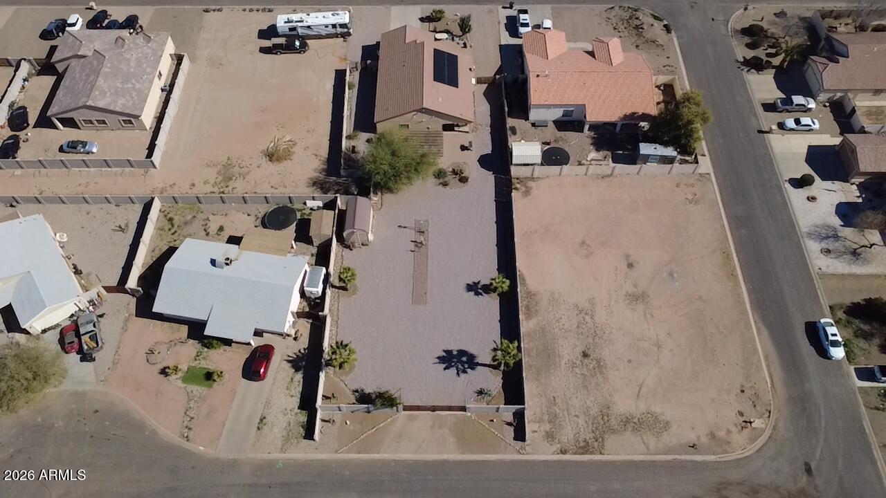 15774 South Saxon Road Arizona City, AZ 85123 - Photo 53 of 53 an aerial view of residential houses with outdoor space