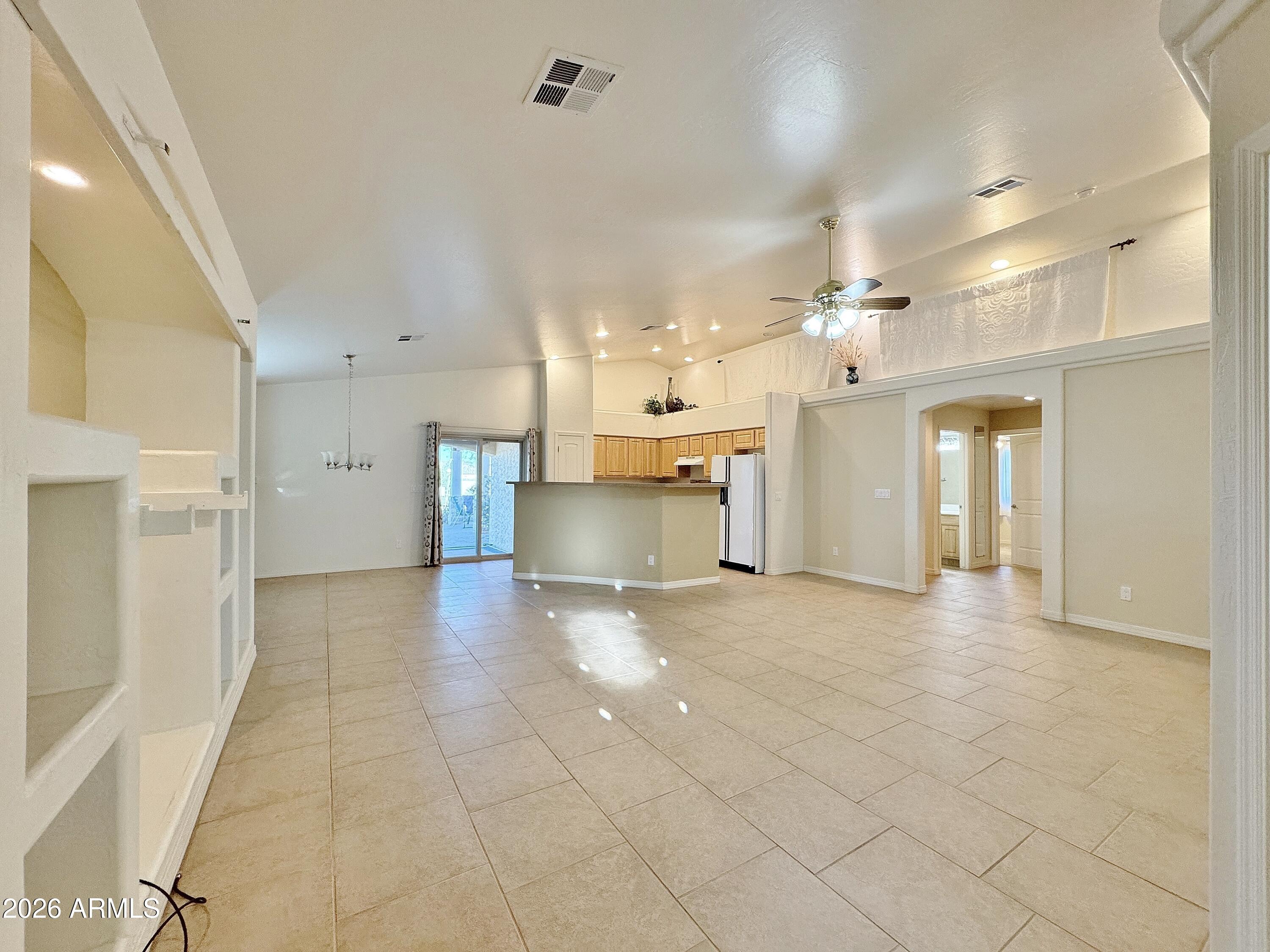 15774 South Saxon Road Arizona City, AZ 85123 - Photo 7 of 53 a view of a kitchen and a kitchen