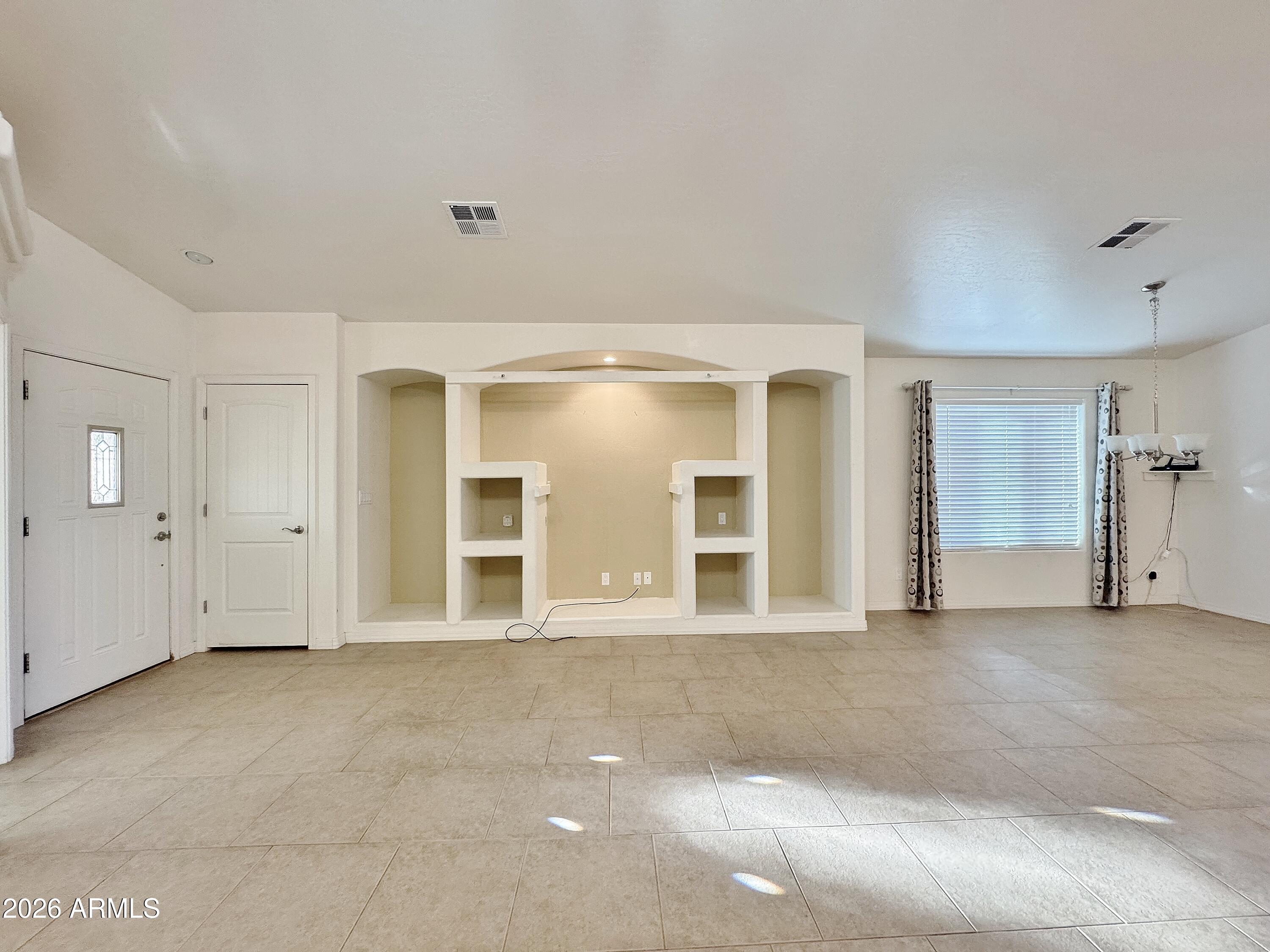 15774 South Saxon Road Arizona City, AZ 85123 - Photo 9 of 53 a view of an empty room