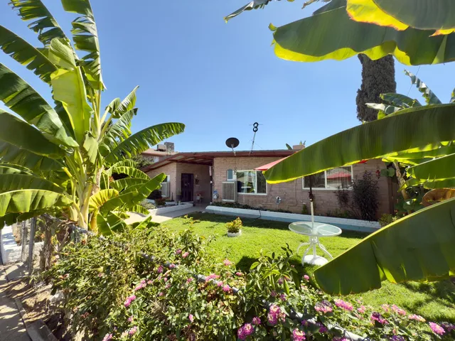 a view of a house with swimming pool