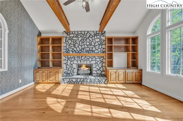 a living room with a couch and a rug