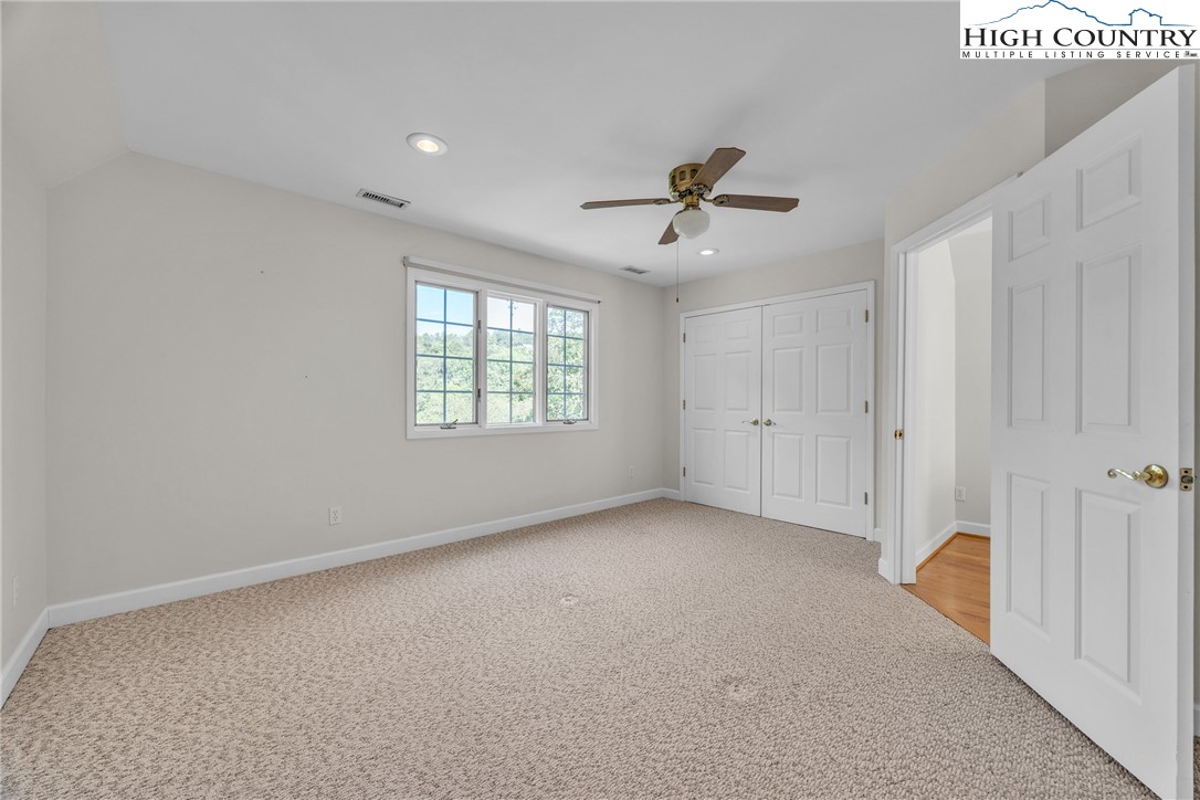 1515 Clifton Road Crumpler, NC 28617 - Photo 15 of 23 a view of an empty room with a window