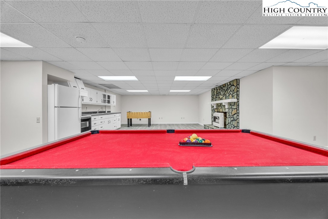 1515 Clifton Road Crumpler, NC 28617 - Photo 17 of 23 a room with pool table and windows