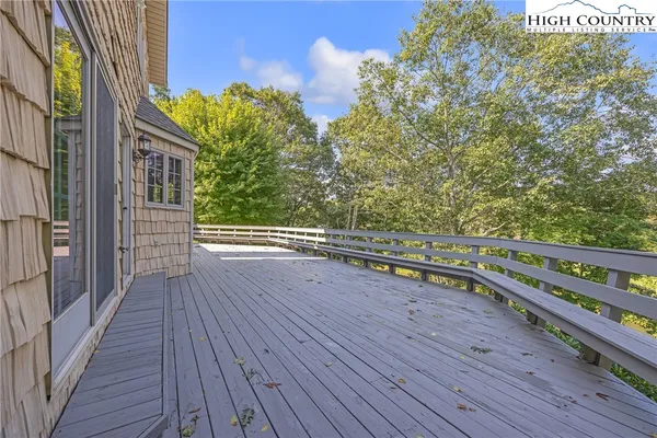 a view of outdoor space with wooden deck