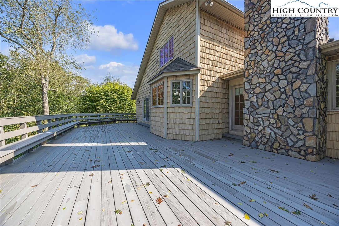 1515 Clifton Road Crumpler, NC 28617 - Photo 6 of 23 a view of wooden floor with a bench
