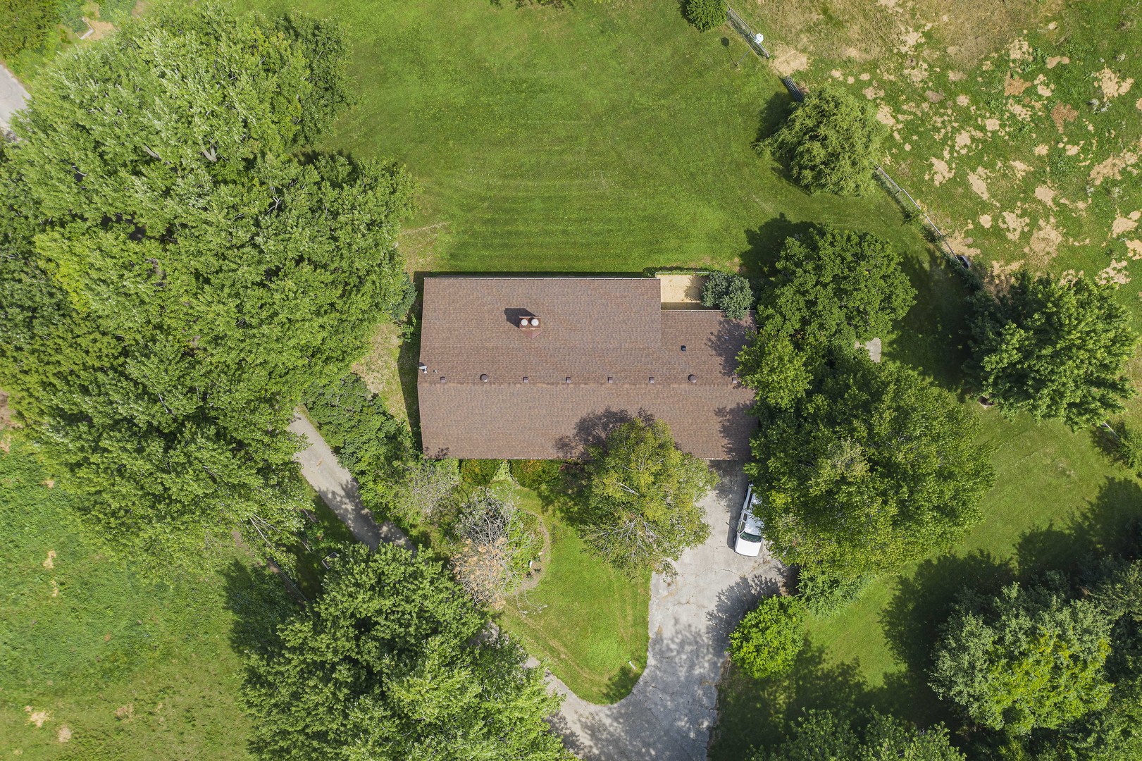 1010 Sunset Road Spring Grove, IL 60081 - Photo 39 of 40 an aerial view of a house with a yard