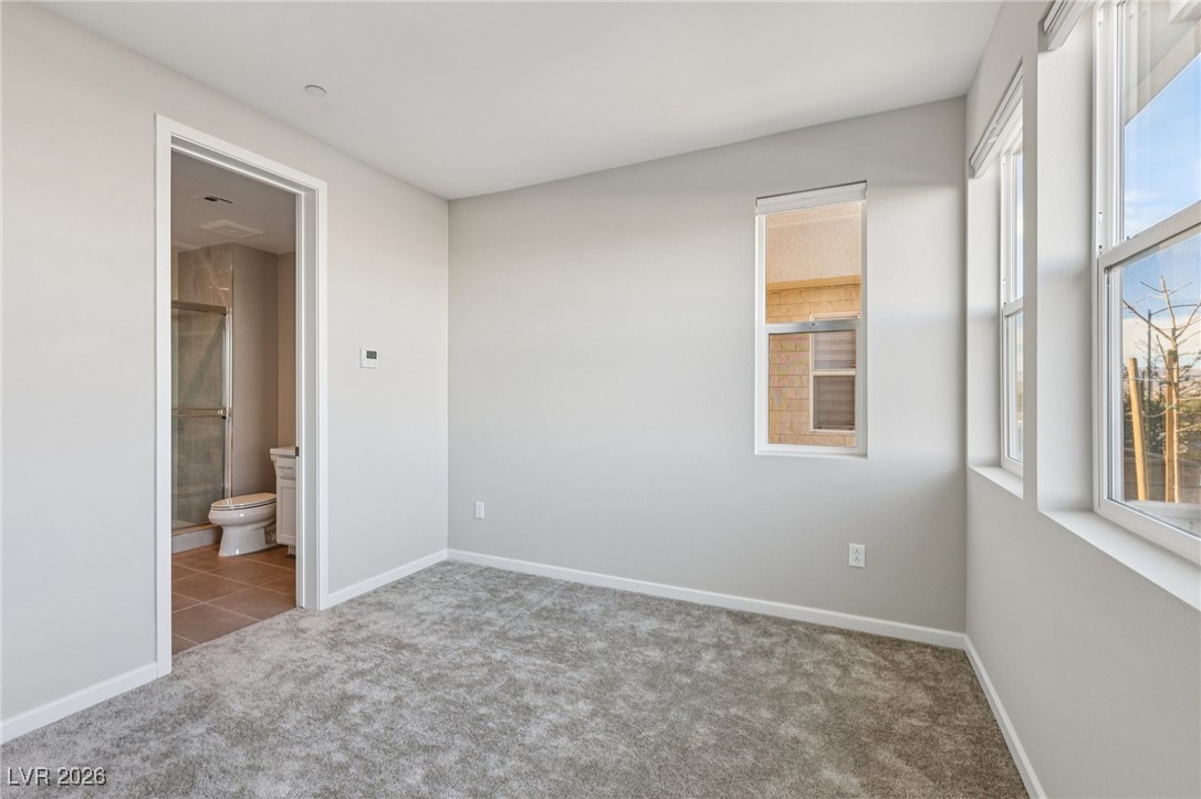 3338 Esker Rdg Avenue Henderson, NV 89044 - Photo 21 of 84 Unfurnished bedroom featuring carpet and ensuite bathroom