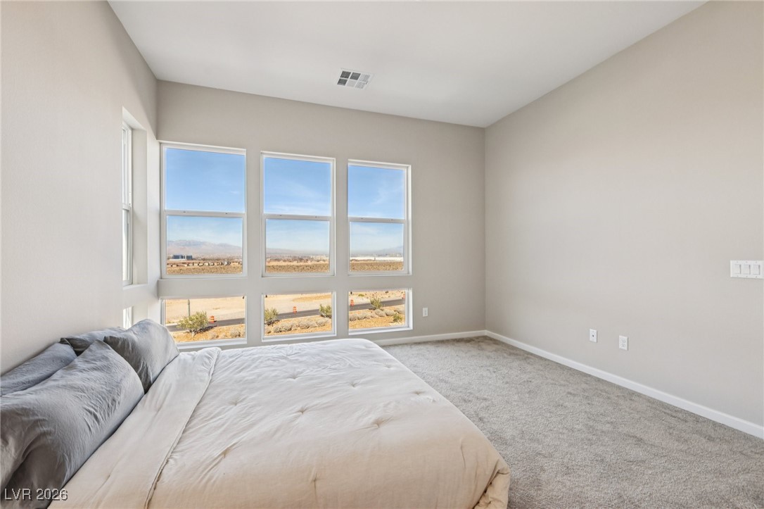 3338 Esker Rdg Avenue Henderson, NV 89044 - Photo 33 of 84 Bedroom featuring carpet floors and baseboards