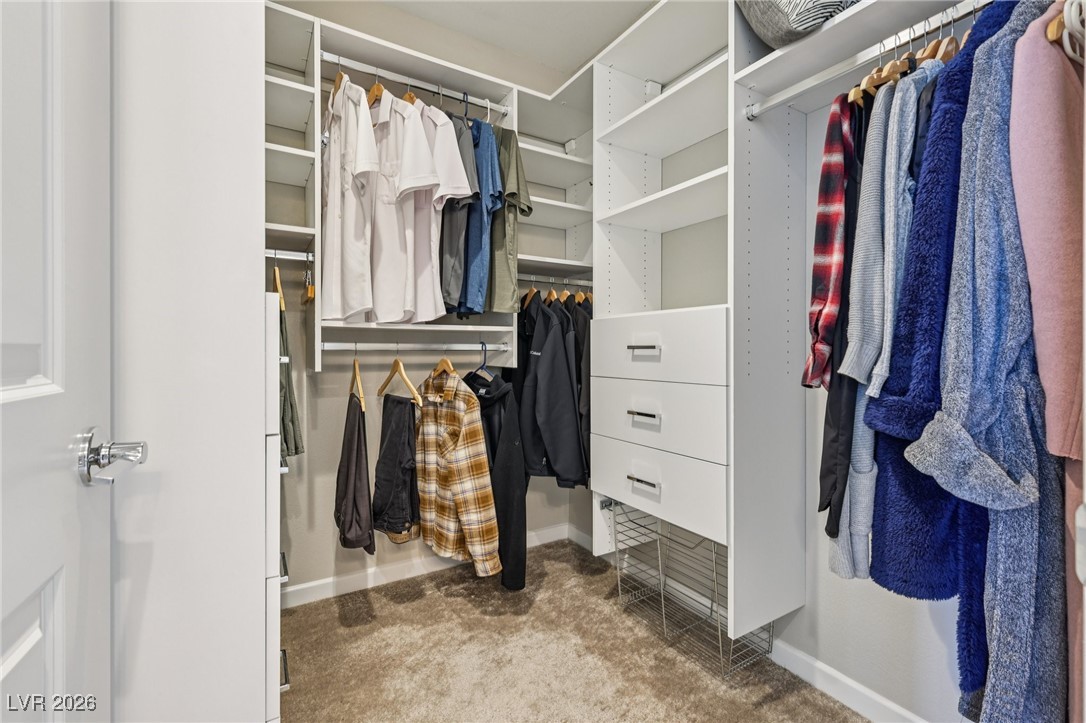 3338 Esker Rdg Avenue Henderson, NV 89044 - Photo 38 of 84 Spacious closet with light colored carpet