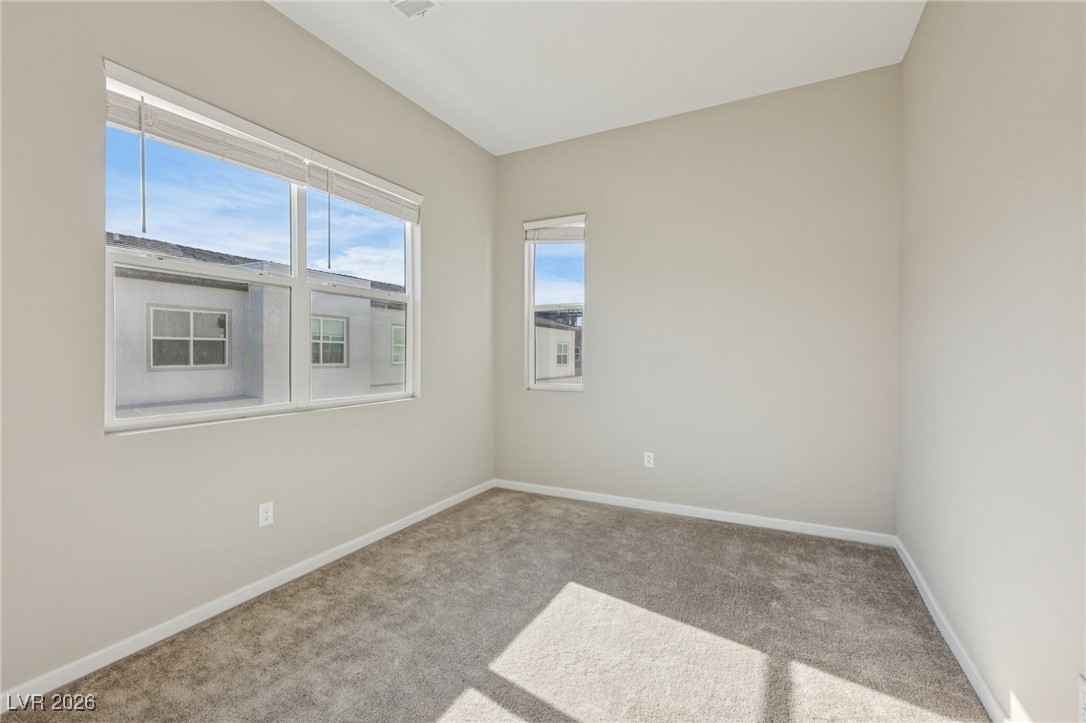 3338 Esker Rdg Avenue Henderson, NV 89044 - Photo 43 of 84 Unfurnished room featuring carpet flooring and baseboards