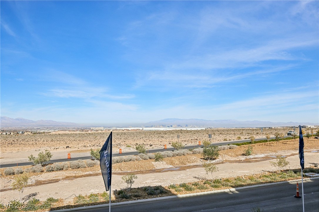 3338 Esker Rdg Avenue Henderson, NV 89044 - Photo 52 of 84 View of yard with a mountain view, view of desert, and a view of rural / pastoral area