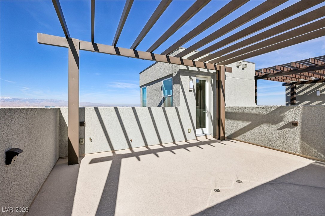 3338 Esker Rdg Avenue Henderson, NV 89044 - Photo 60 of 84 Balcony featuring a pergola