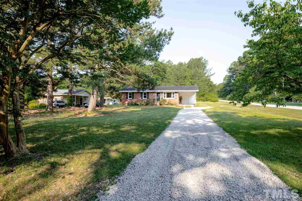 4005 Lizard Lick Road Wendell, NC 27591 - Photo 25 of 25 a front view of a house with garden