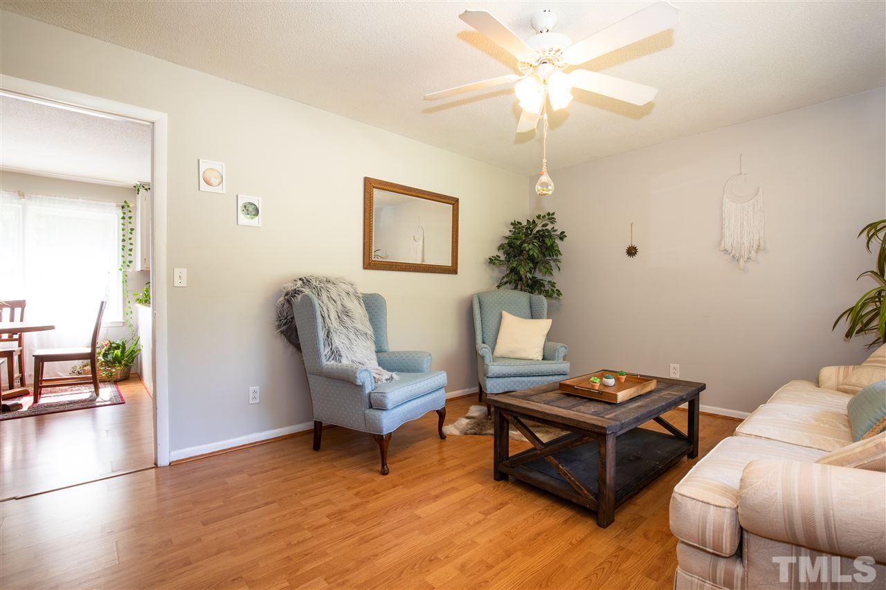 4005 Lizard Lick Road Wendell, NC 27591 - Photo 5 of 25 a living room with furniture and a table