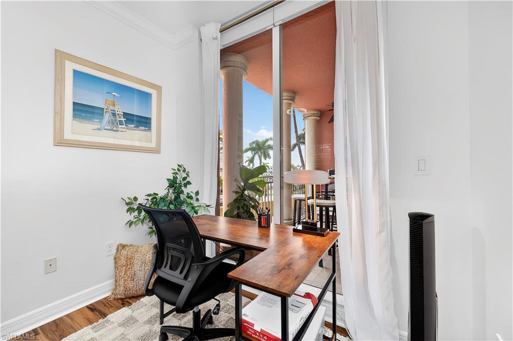 450 Bayfront Place, Unit 4202 Naples, FL 34102 - Photo 13 of 39 Office featuring wood finished floors, expansive windows, and ornamental molding