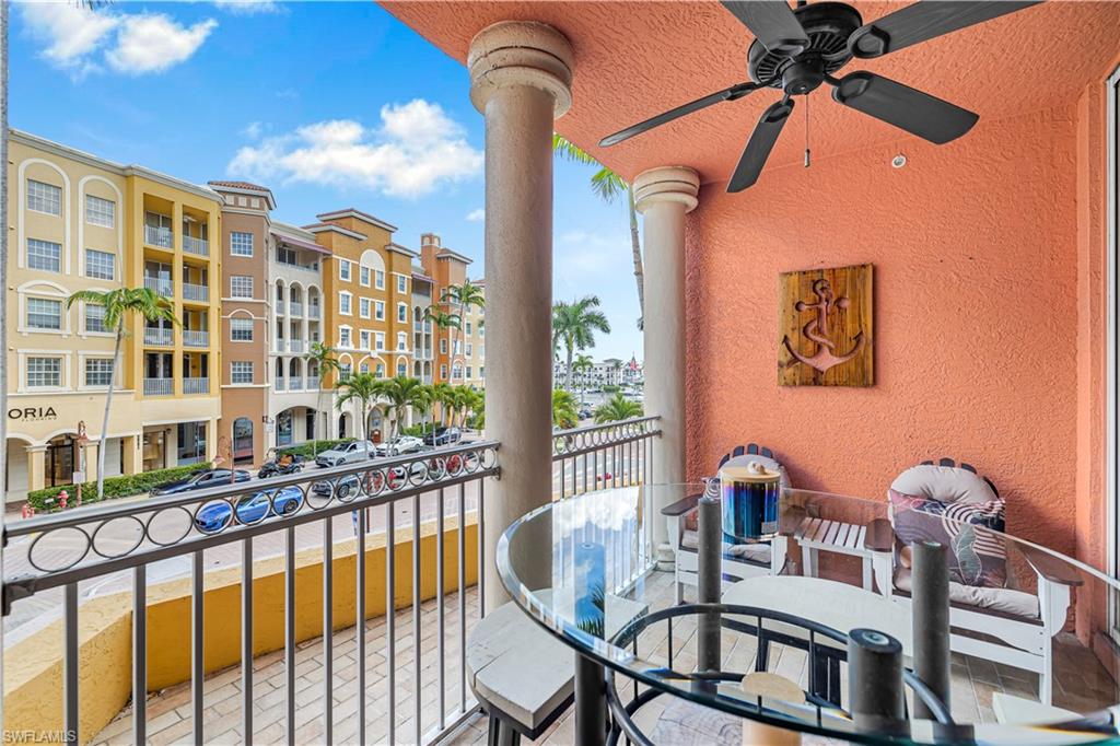 450 Bayfront Place, Unit 4202 Naples, FL 34102 - Photo 19 of 39 Balcony with outdoor dining area and a ceiling fan