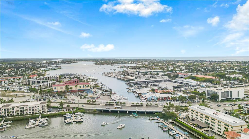 450 Bayfront Place, Unit 4202 Naples, FL 34102 - Photo 30 of 39 Bird's eye view of numerous boat docks and a large body of water