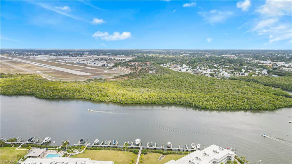 450 Bayfront Place, Unit 4202 Naples, FL 34102 - Photo 34 of 39 Drone / aerial view of a nearby body of water