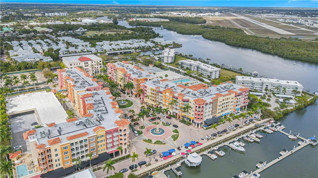 450 Bayfront Place, Unit 4202 Naples, FL 34102 - Photo 36 of 39 Aerial view of property's location with a large body of water and apartment complex