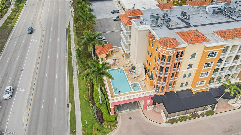 450 Bayfront Place, Unit 4202 Naples, FL 34102 - Photo 38 of 39 Bird's eye view of apartment complex / building and a pool