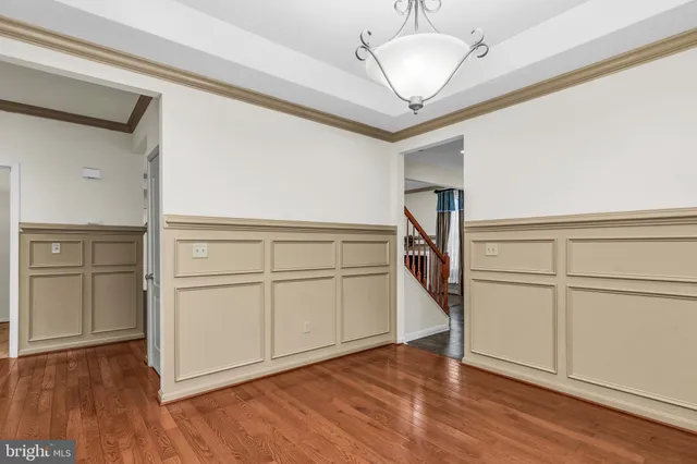a view of a storage & utility room with wooden floor
