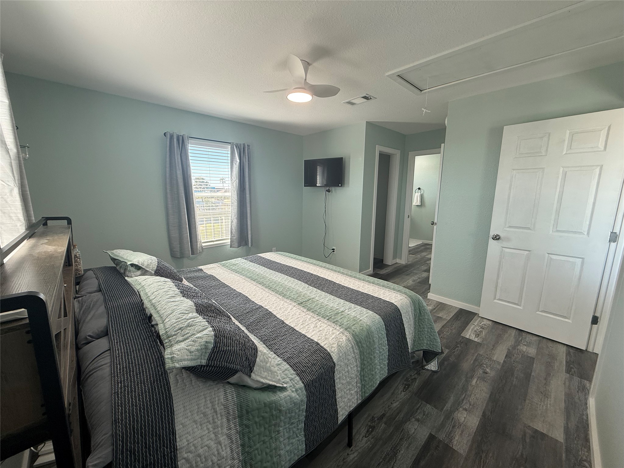 1118 County Road 204 Sargent, TX 77414 - Photo 14 of 36 a bedroom with a bed and a window