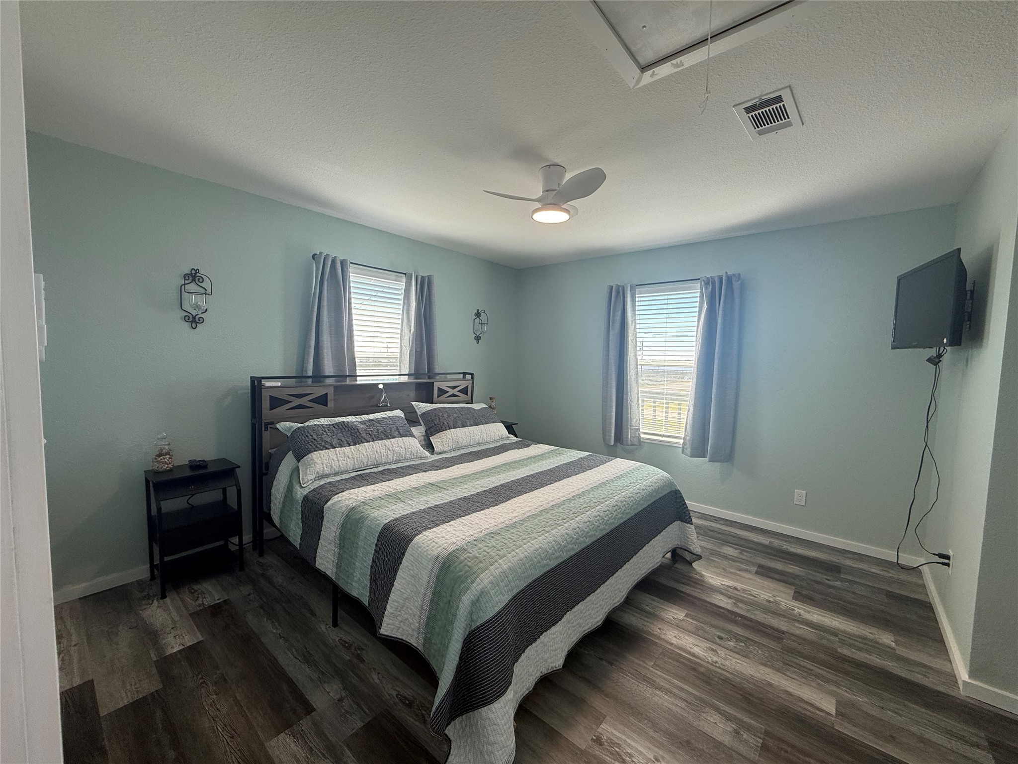 1118 County Road 204 Sargent, TX 77414 - Photo 15 of 36 a bedroom with a bed and a window