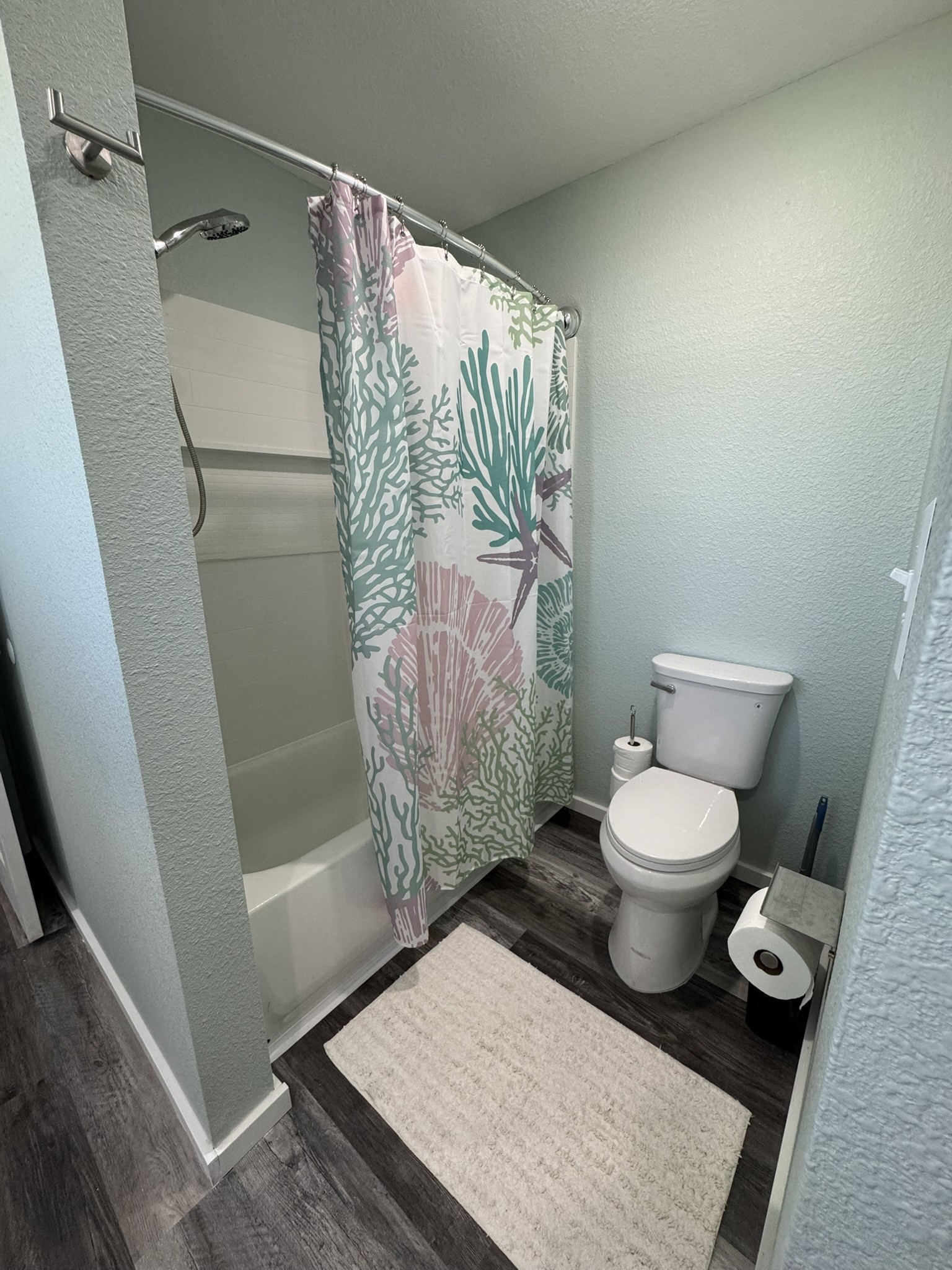 1118 County Road 204 Sargent, TX 77414 - Photo 21 of 36 a bathroom with a toilet and a shower