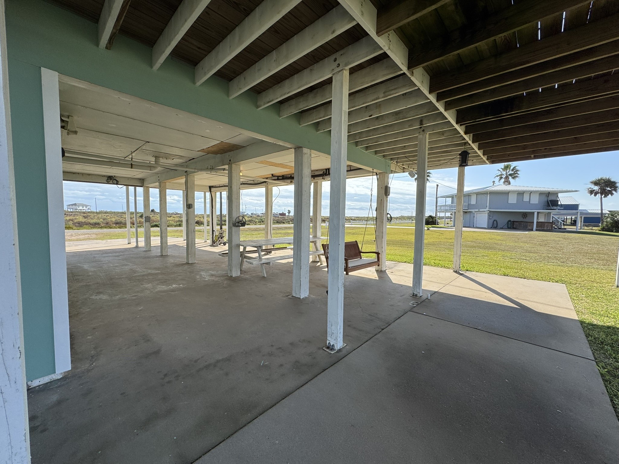 1118 County Road 204 Sargent, TX 77414 - Photo 28 of 36 a view of an empty room with a sliding door
