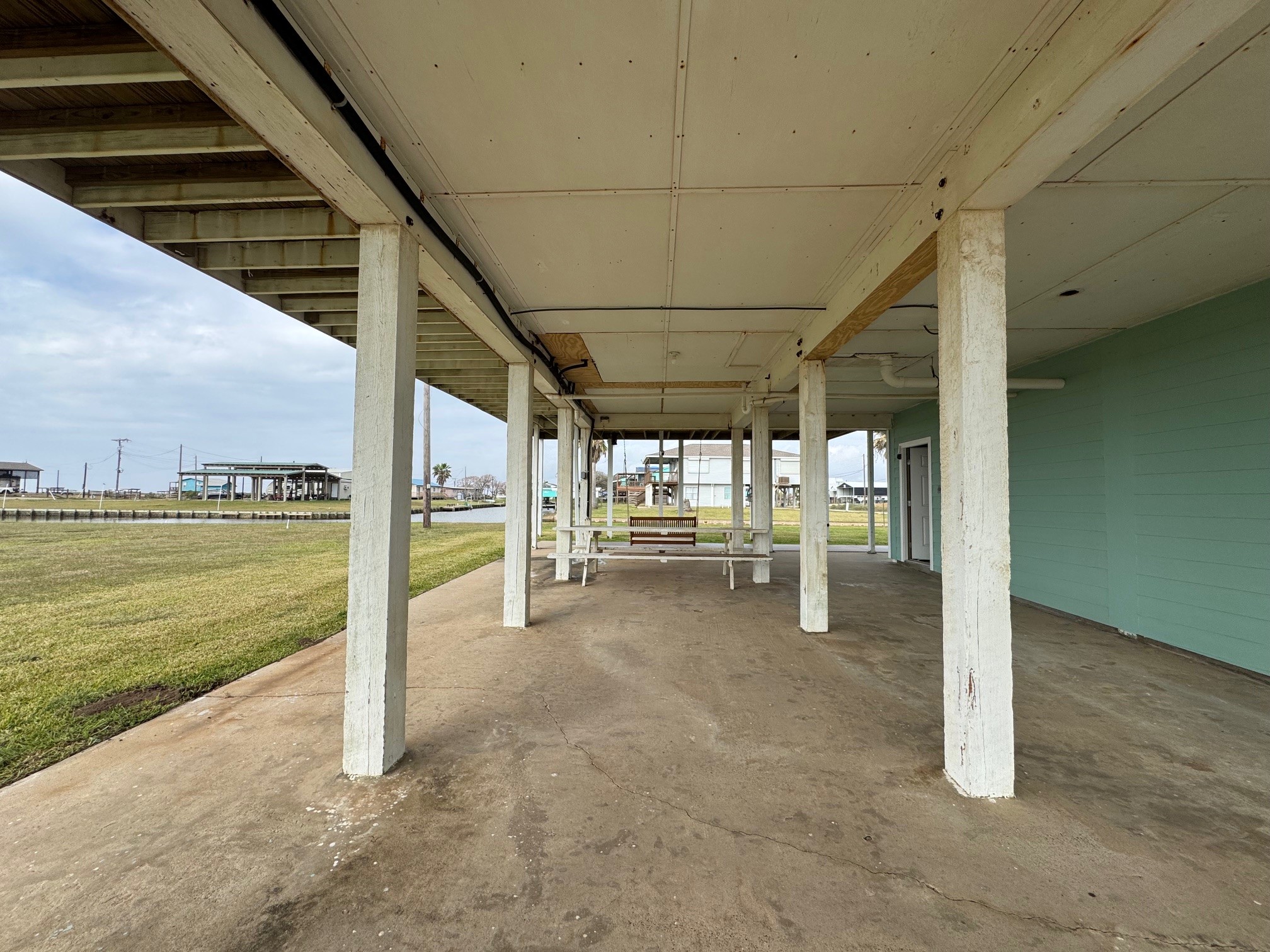 1118 County Road 204 Sargent, TX 77414 - Photo 29 of 36 a view of a room with wooden floor